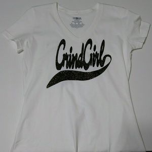 Grind Girl sports lettering.